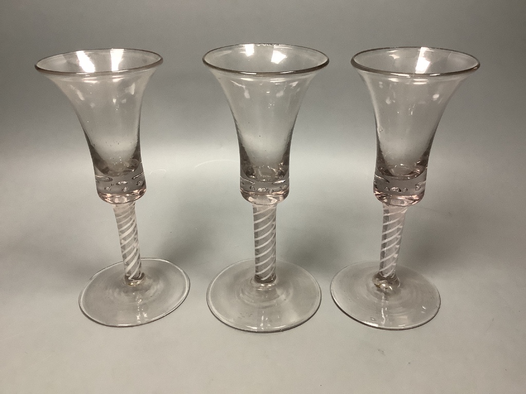 A trio of George III style cotton twist stemmed glasses
